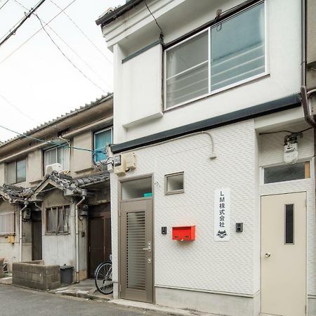 Apartamento Sakuragawa No Shima Osaka Exterior foto