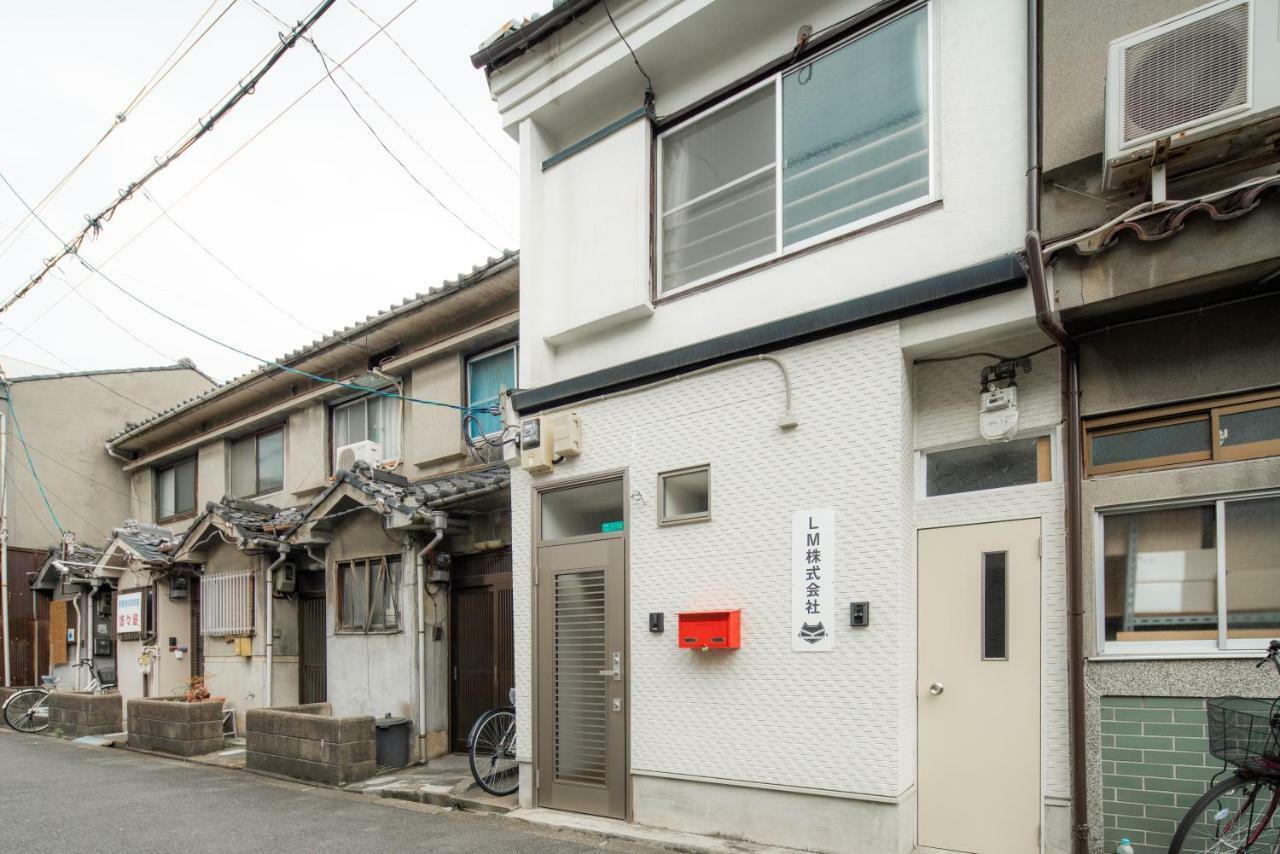Apartamento Sakuragawa No Shima Osaka Exterior foto