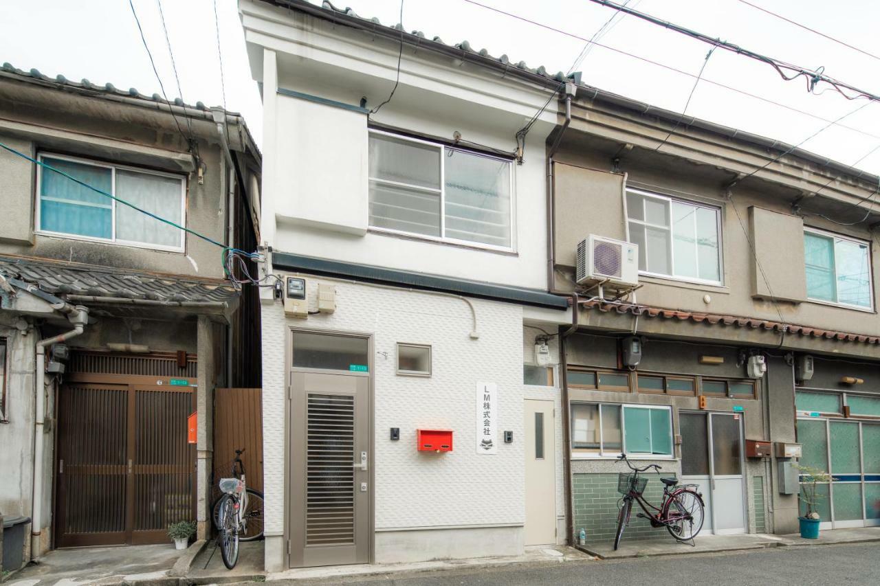 Apartamento Sakuragawa No Shima Osaka Exterior foto