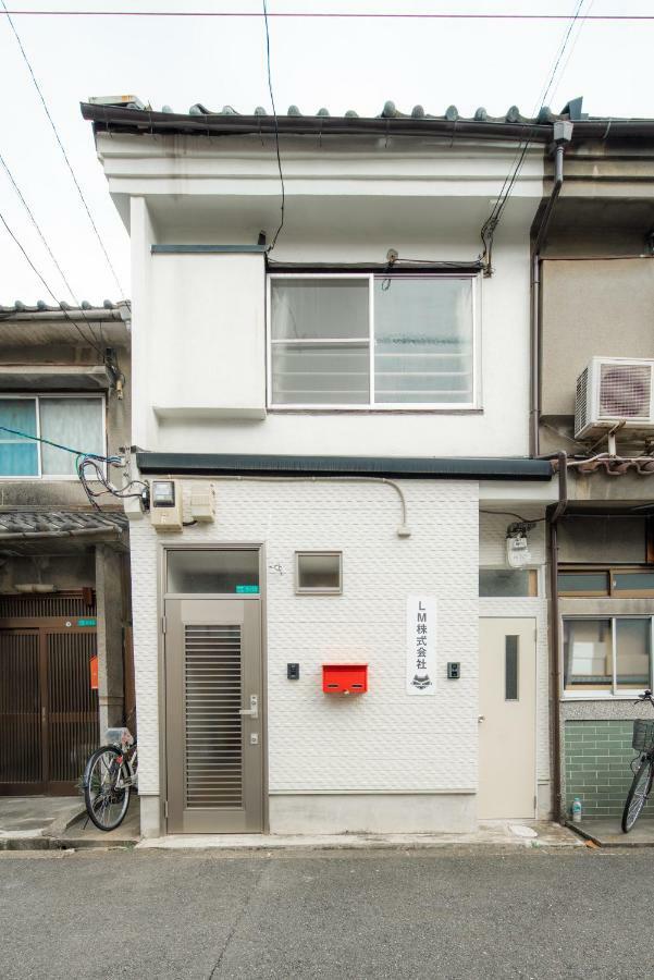 Apartamento Sakuragawa No Shima Osaka Exterior foto